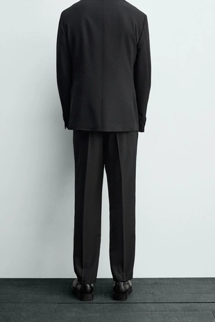 Костюмные брюки из шерсти- Заказать в России