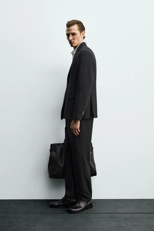 Костюмные брюки из шерсти- Заказать в России