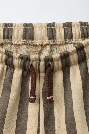 Брюки из мягкой ткани в полоску- Заказать в России