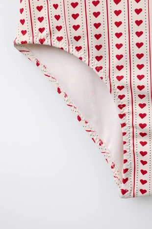 6-14 лет/купальник с воланами и принтом «сердца»- Заказать в России