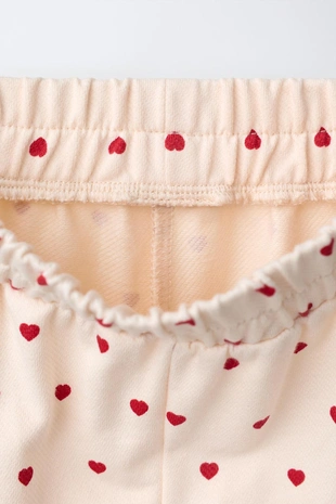 Брюки с защипами и сердечками- Заказать в России