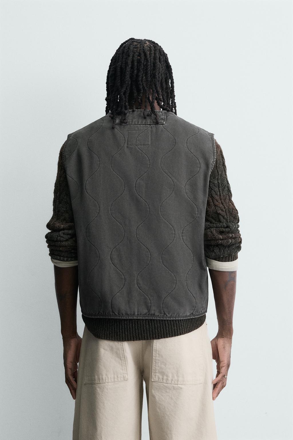 ЖИЛЕТ С ЭФФЕКТОМ ПОТЕРТОСТИ И ОТСТРОЧКОЙ