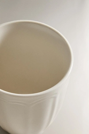 Фарфоровая кружка с рельефным дизайном- Заказать в России