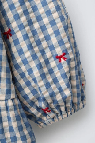 Платье в клетку с вышитыми бантами- Заказать в России