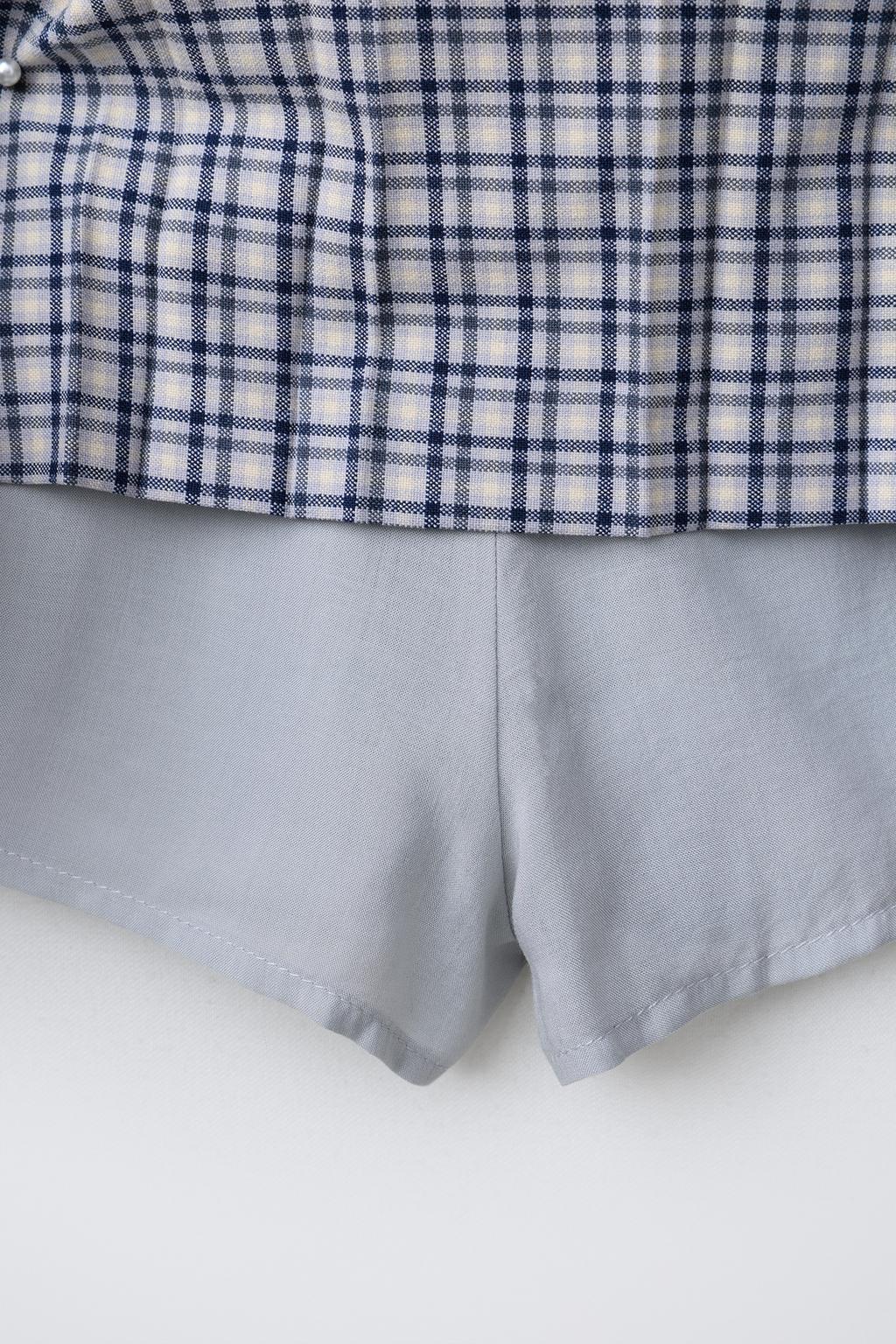 ЮБКА В КЛЕТКУ С ПУГОВИЦАМИ