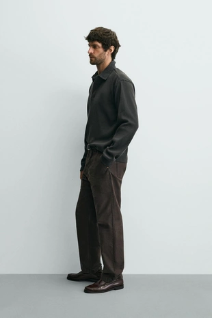 Поло из рельефного трикотажа с комбинированным воротником- Заказать в России