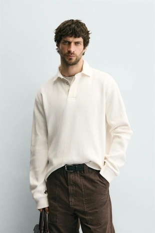 Поло из хлопка с рельефным узором и контрастным воротником