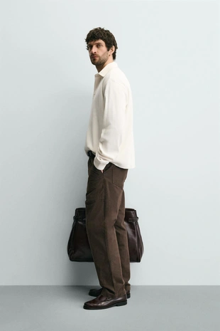 Поло из хлопка с рельефным узором и контрастным воротником