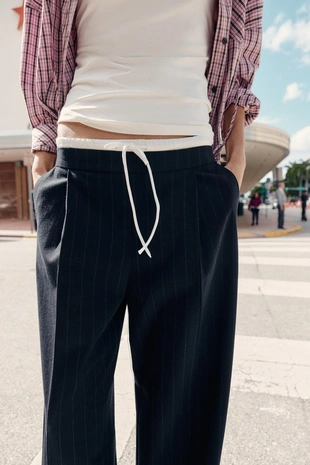 Брюки с широкими штанинами и двойным поясом- Заказать в России