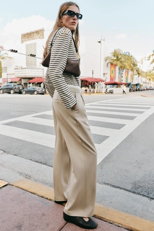 Брюки с широкими штанинами и двойным поясом- Заказать в России