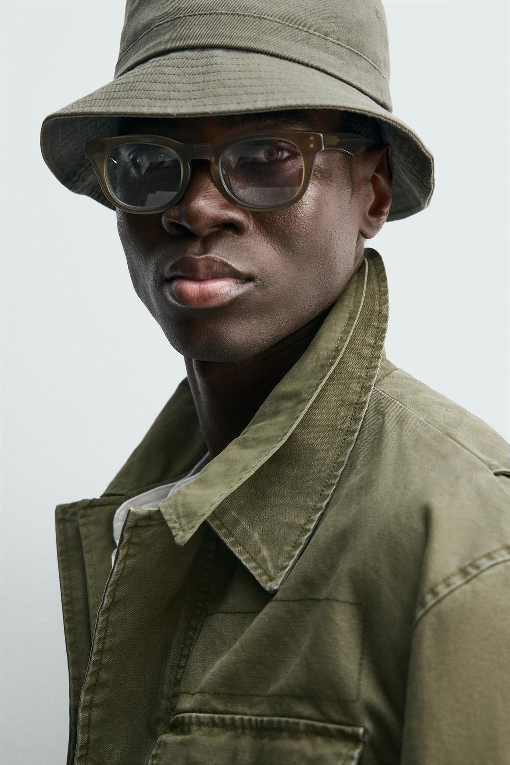 КУРТКА С МНОЖЕСТВОМ КАРМАНОВ И ЭФФЕКТОМ ПОТЕРТОСТИ