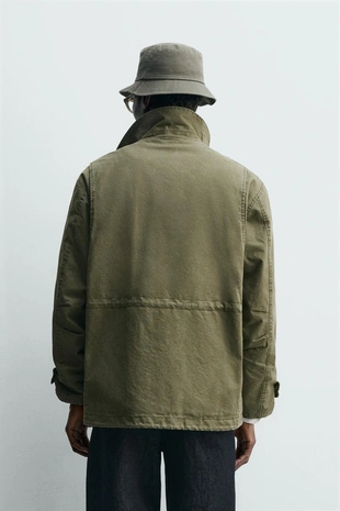 Куртка с множеством карманов и эффектом потертости- Заказать в России