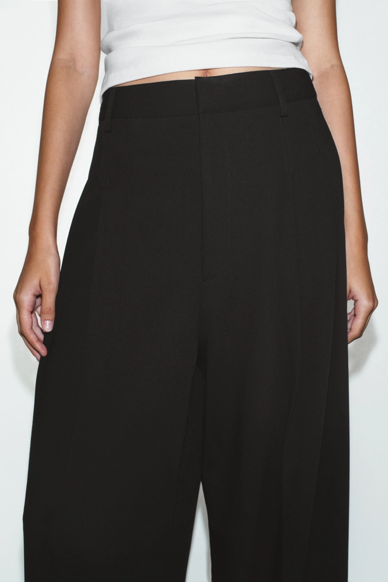 Брюки со складками