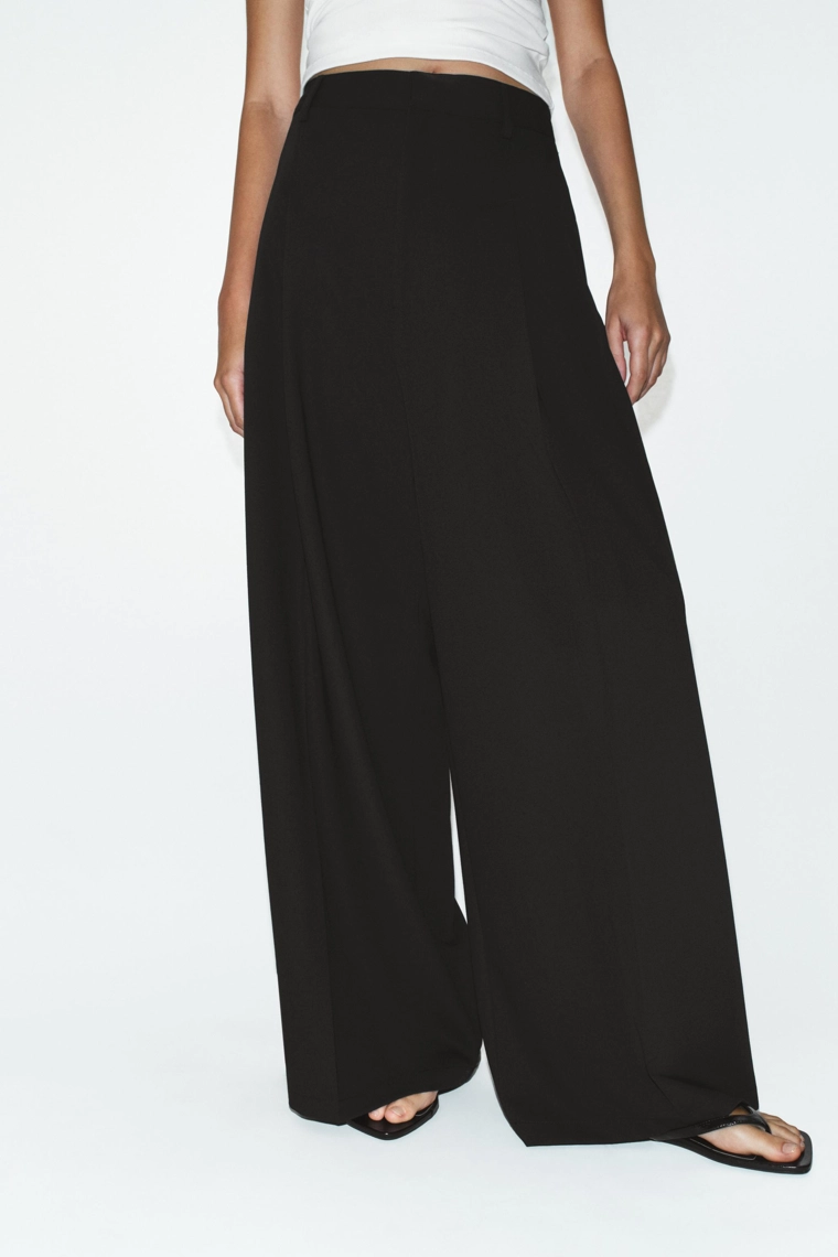 Брюки со складками