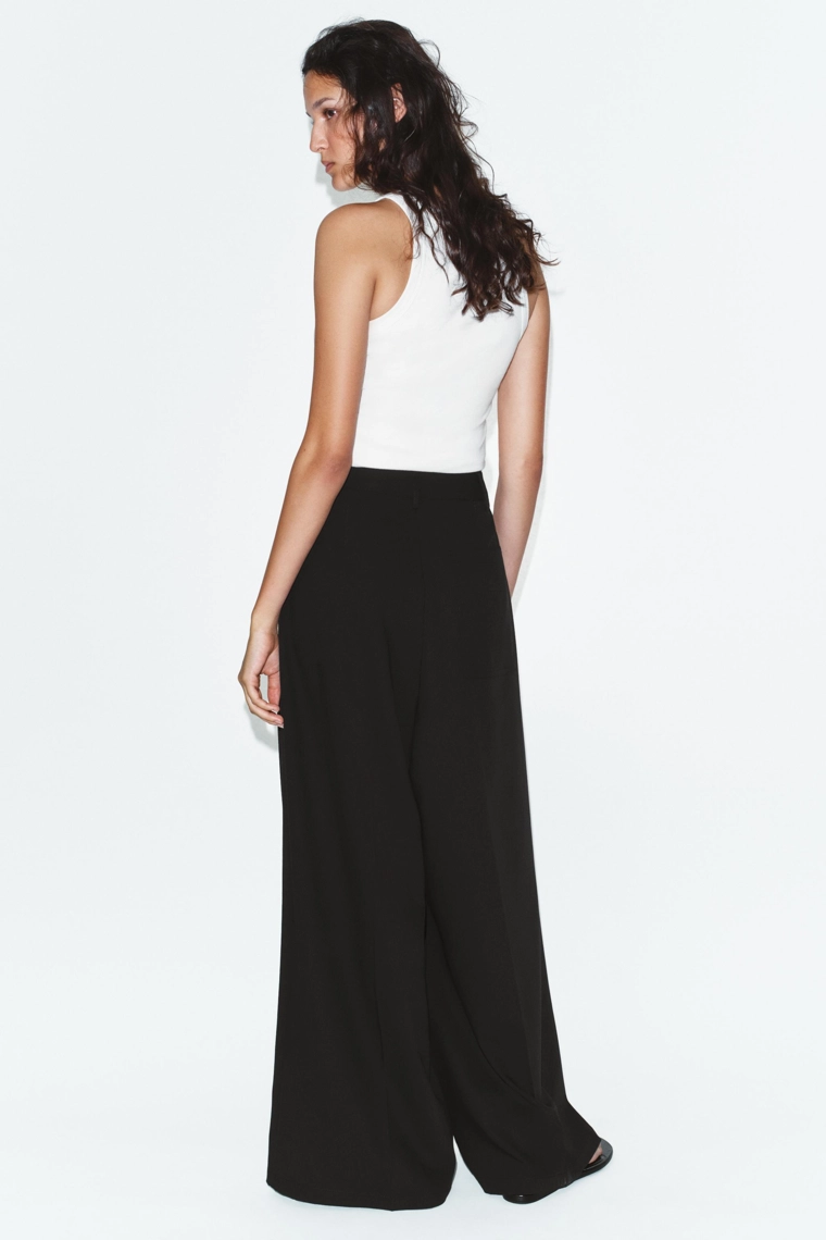 Брюки со складками