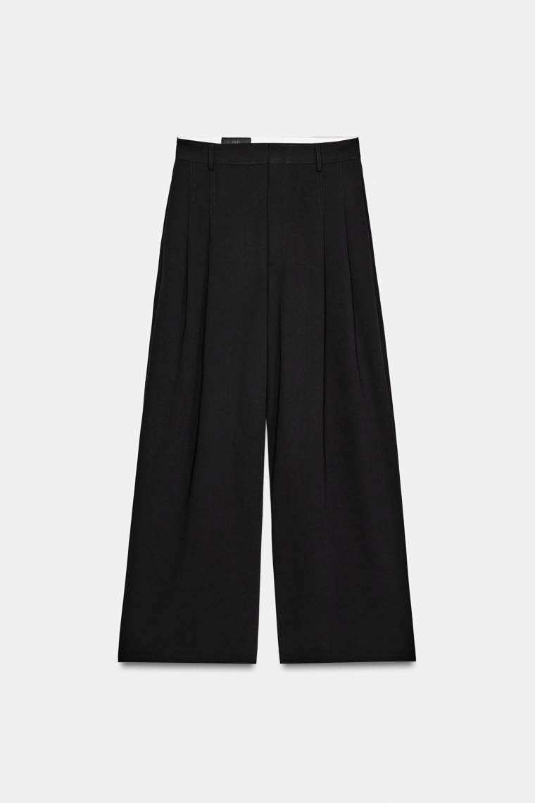 Брюки со складками