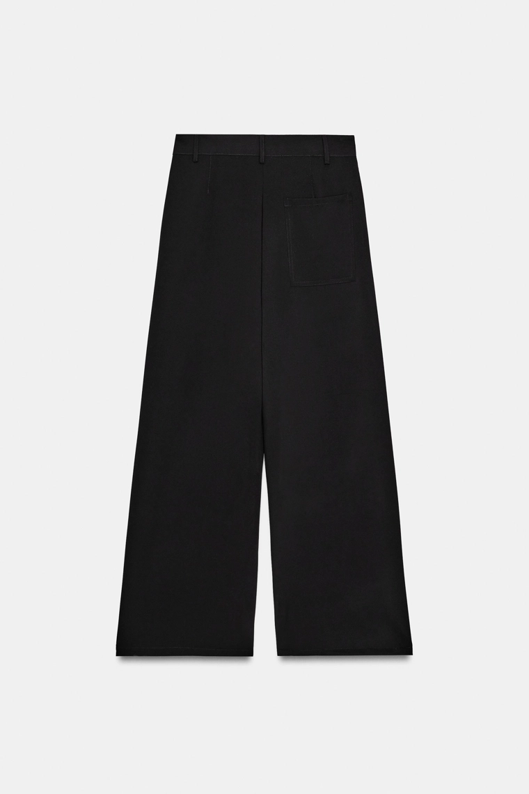 Брюки со складками