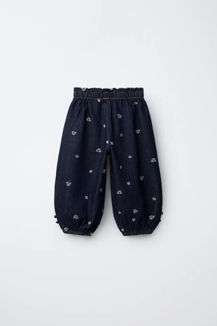 Джинсы бомбачо с вышитыми цветами- Заказать в России