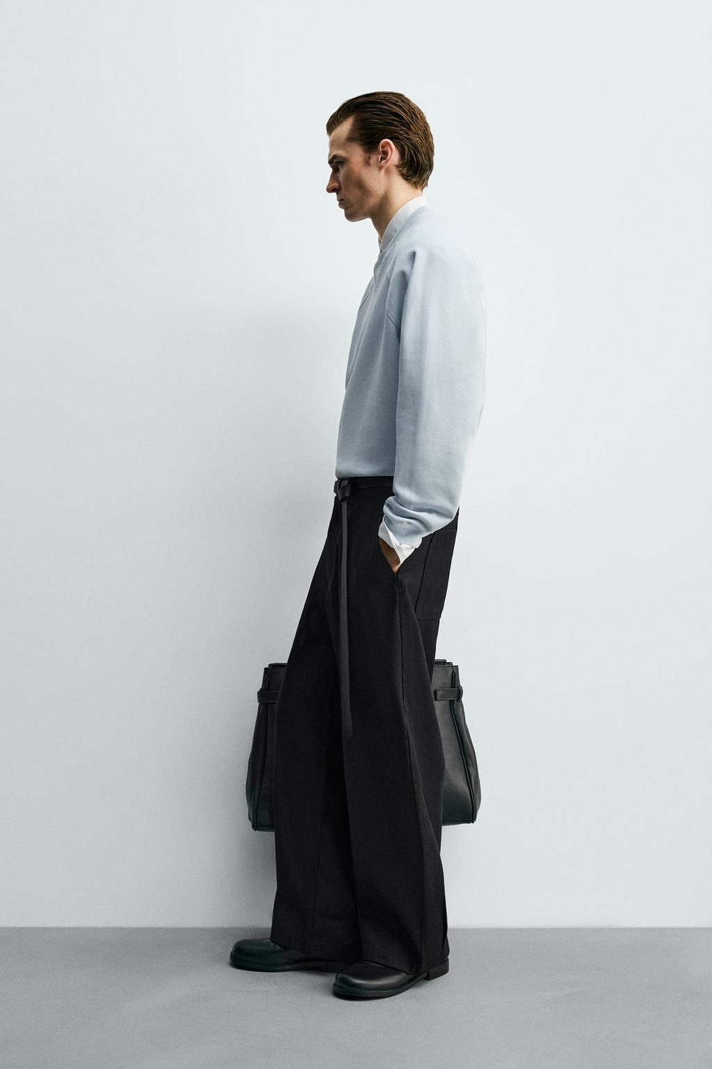 ТОЛСТОВКА ИЗ ТКАНИ ПИКЕ С ЭФФЕКТОМ ПОТЕРТОСТИ