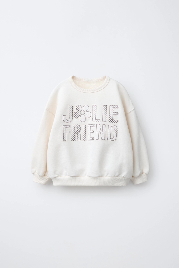 Свитшот с лозунгом и полосатым принтом