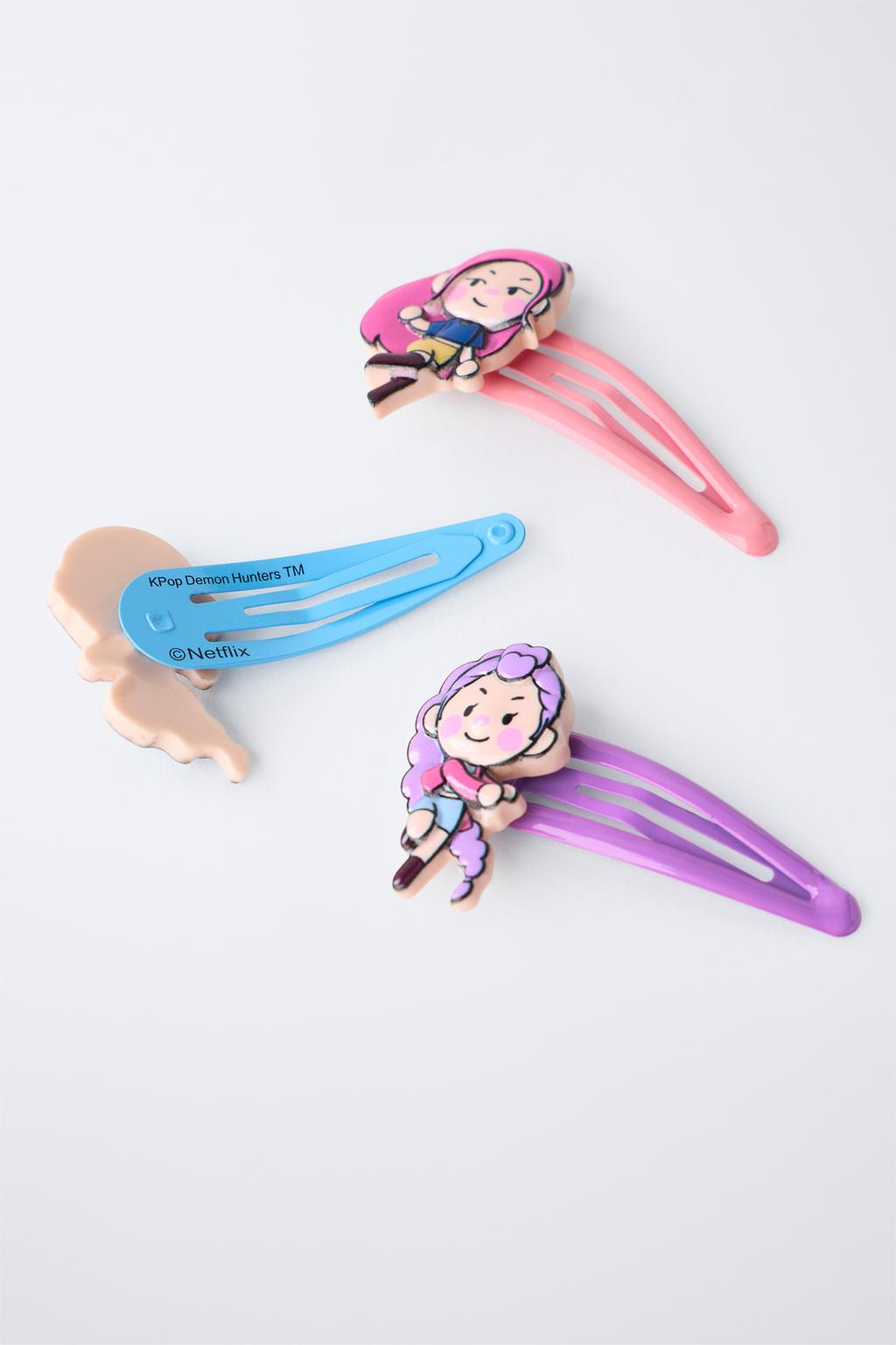 НАБОР ИЗ ТРЕХ ЗАКОЛОК ДЛЯ ВОЛОС KPOP DEMON HUNTERS™ NETFLIX ©