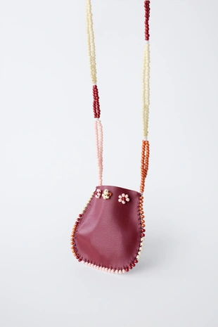 Ожерелье с бусинами и сумочкой- Заказать в России