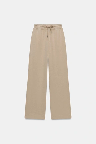 Брюки из трикотажа интерлок с эффектом потертости- Заказать в России