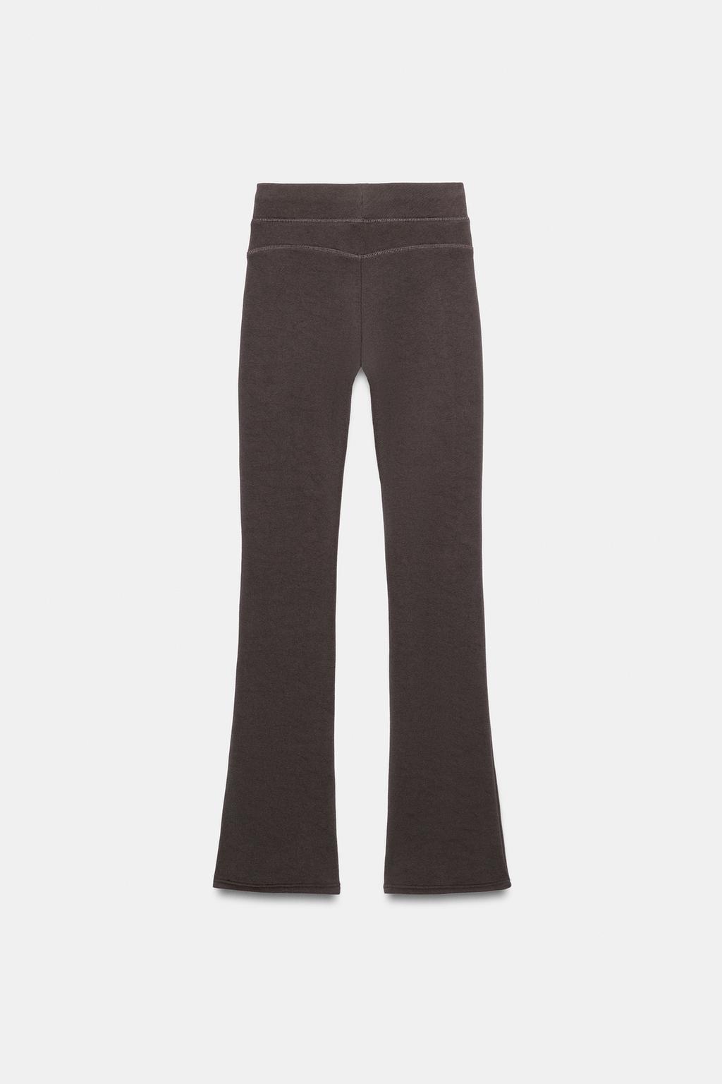 РАСКЛЕШЕННЫЕ БРЮКИ С ЭФФЕКТОМ ПОТЕРТОСТИ