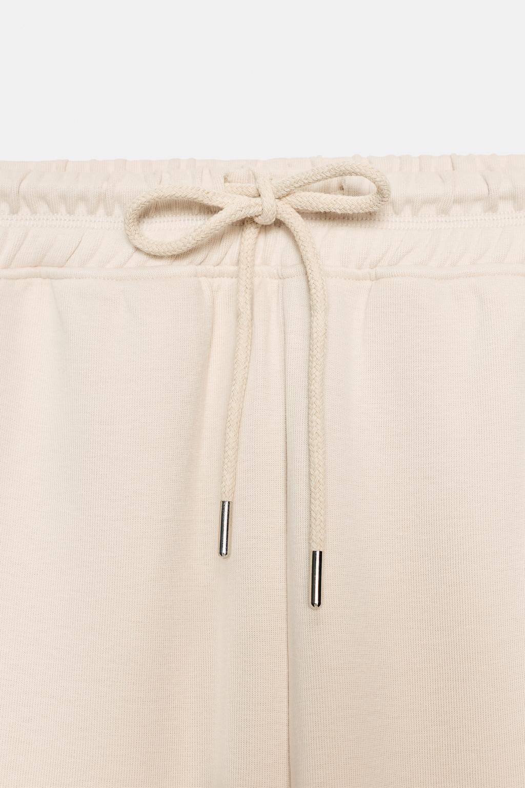 БРЮКИ ИЗ ТРИКОТАЖА ИНТЕРЛОК С ЭФФЕКТОМ ПОТЕРТОСТИ