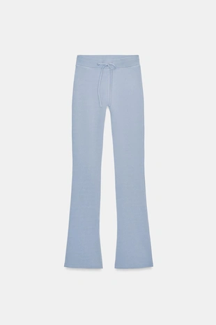 Расклешенные брюки с эффектом потертости- Заказать в России