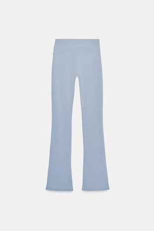 Расклешенные брюки с эффектом потертости- Заказать в России