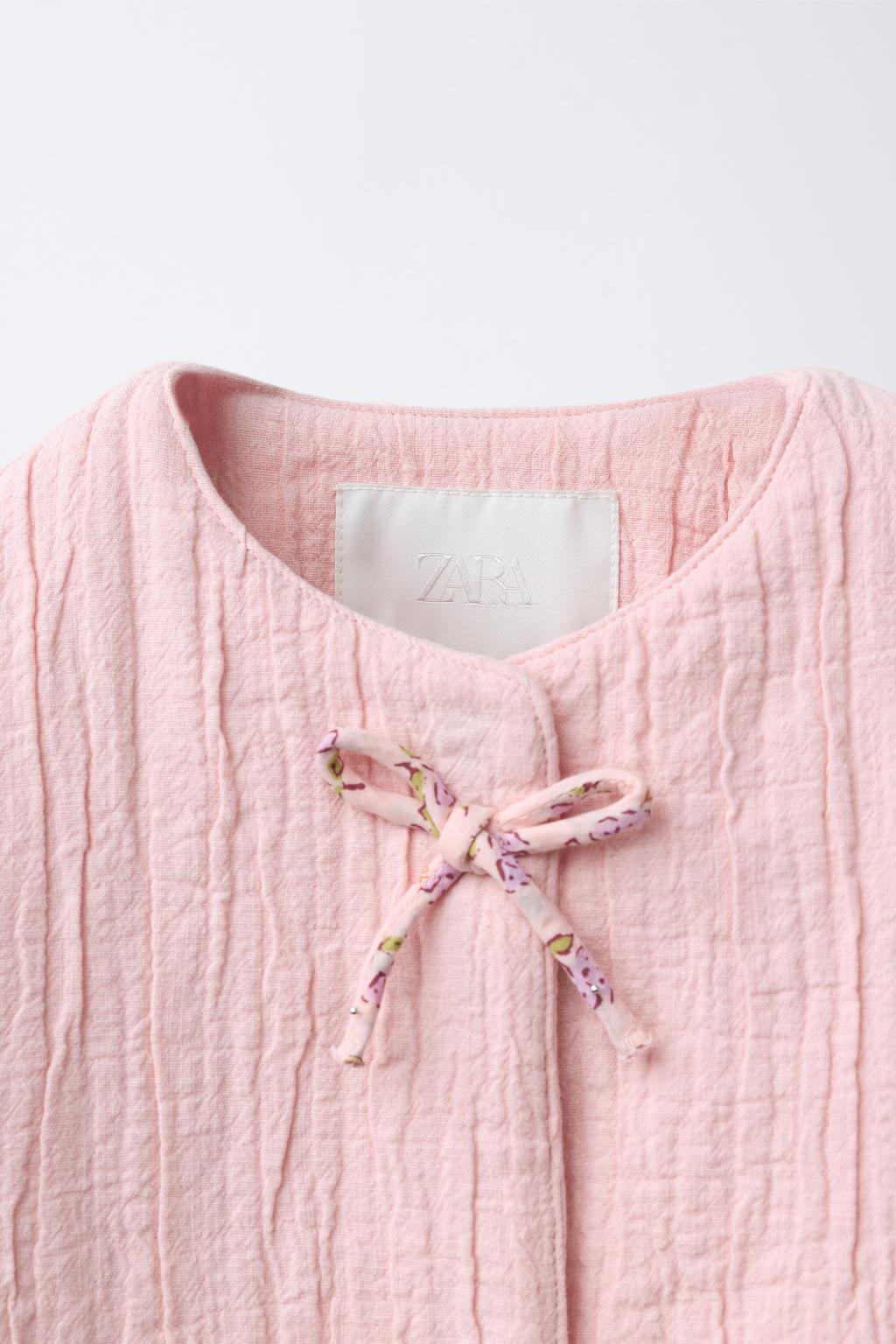 КУРТКА С ТЕКСТУРОЙ И БАНТАМИ