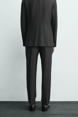 Костюмные брюки в тонкую полоску- Заказать в России