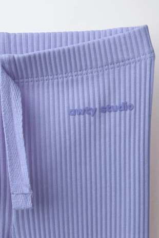 Легинсы в рубчик со шнурком