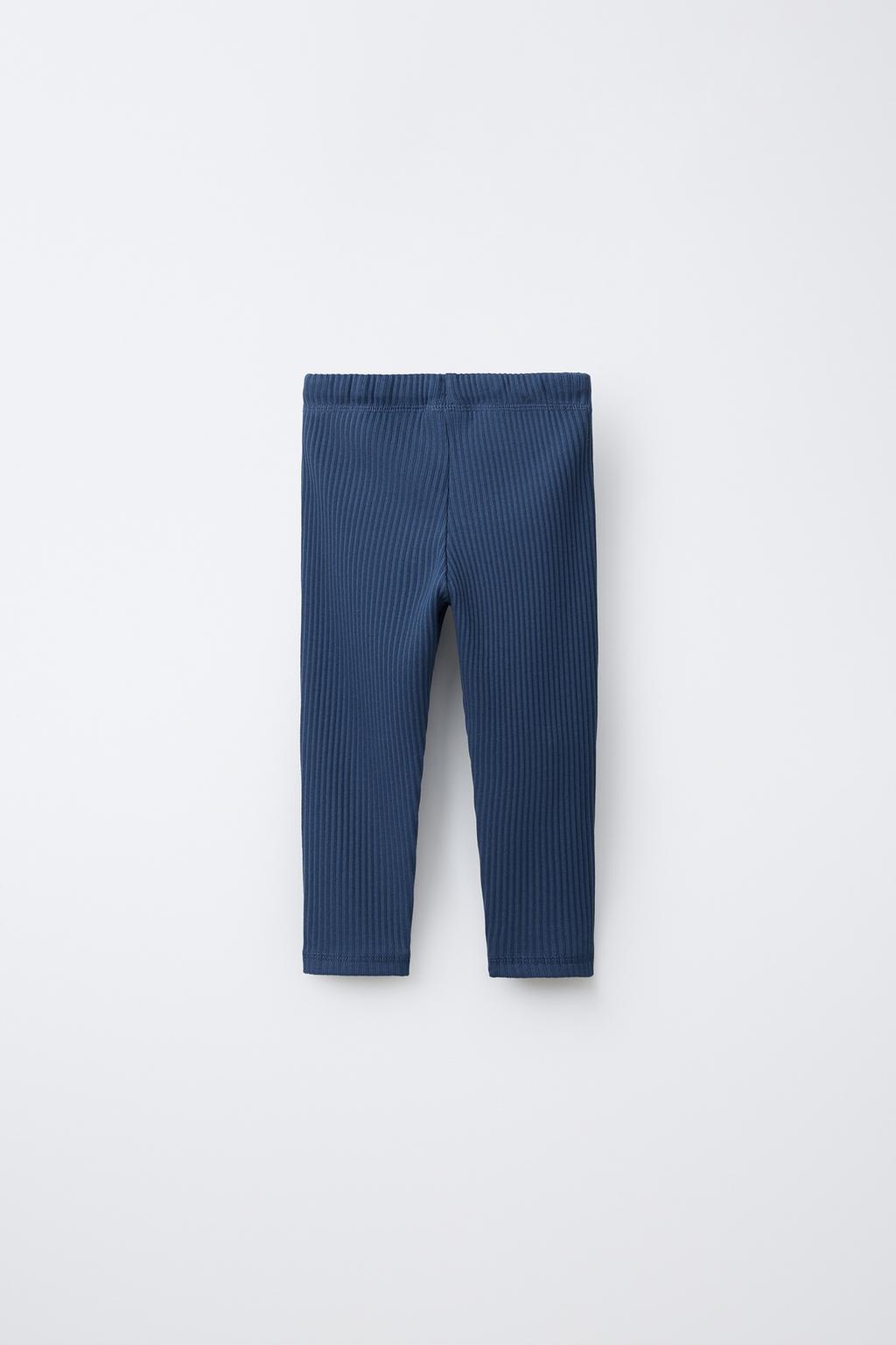 ОДНОТОННЫЕ ЛЕГИНСЫ С НАШИВКОЙ