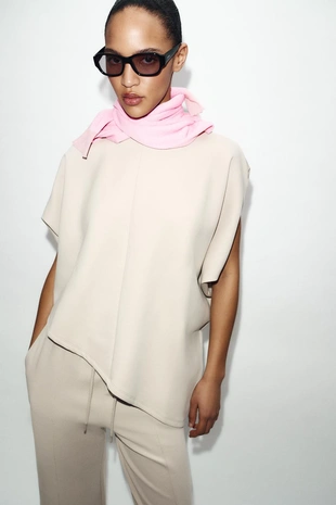 Накидка асимметричного кроя из интерлока- Заказать в России