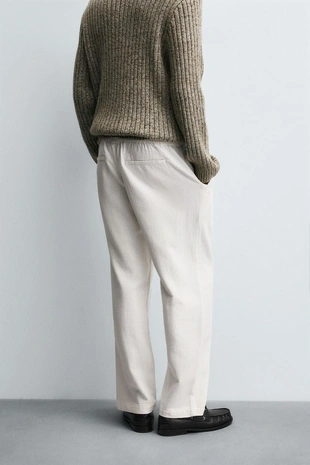 Текстурированные брюки свободного кроя- Заказать в России