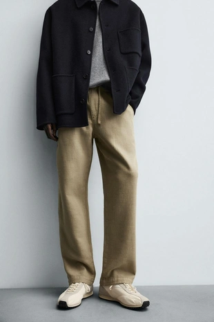 Текстурированные брюки свободного кроя- Заказать в России