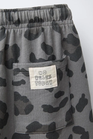 Брюки STRAIGHT из мягкой ткани с анималистическим принтом- Заказать в России