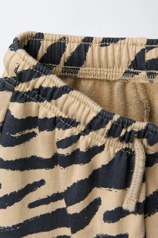 Брюки STRAIGHT из мягкой ткани с анималистическим принтом- Заказать в России