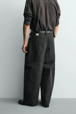 Брюки RELAXED FIT с измененной линией шва- Заказать в России