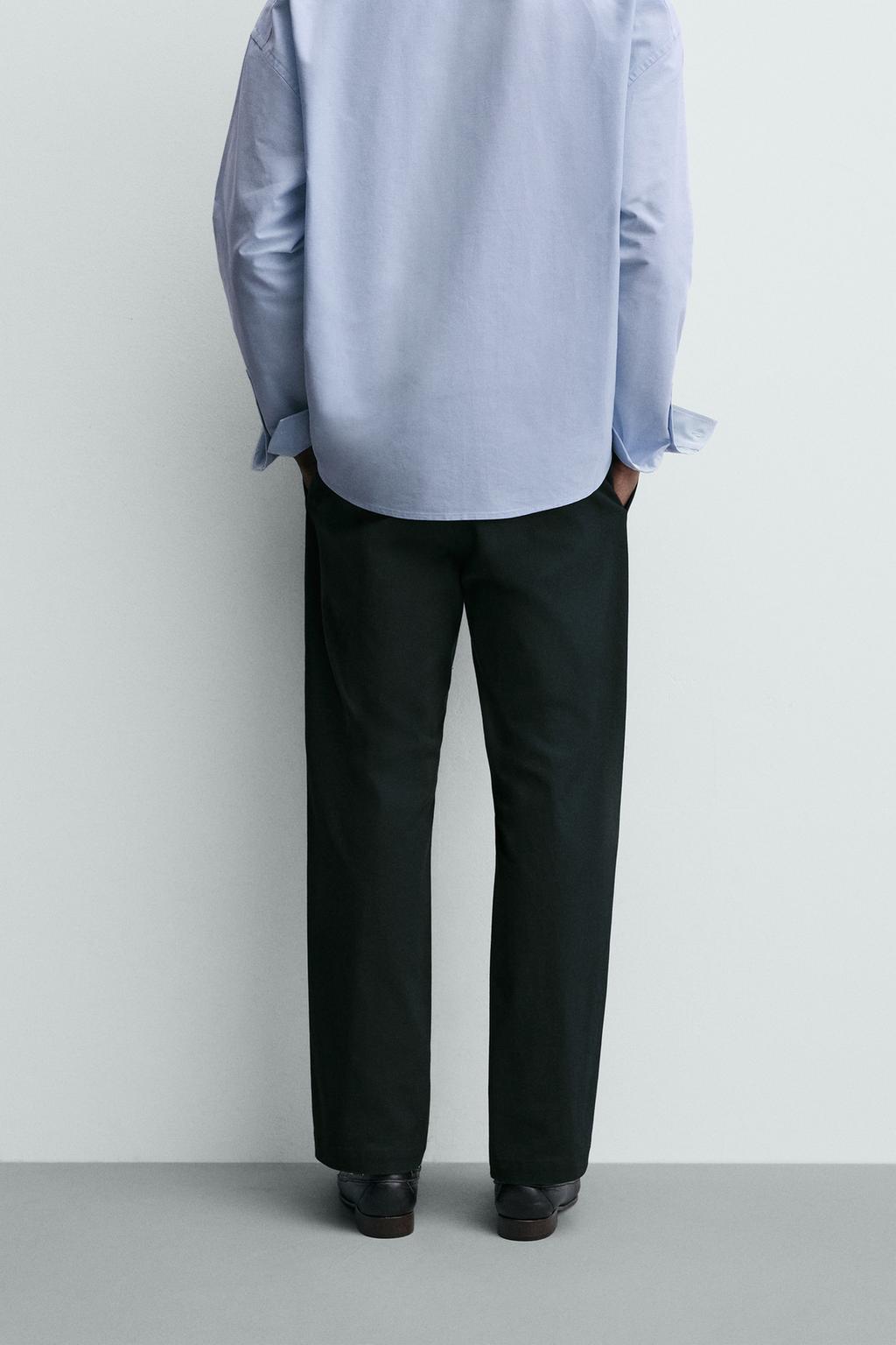 БРЮКИ СО СКЛАДКАМИ ИЗ РЕЛЬЕФНОЙ ТКАНИ