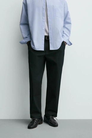 Брюки со складками из рельефной ткани- Заказать в России