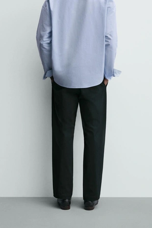 Брюки со складками из рельефной ткани- Заказать в России