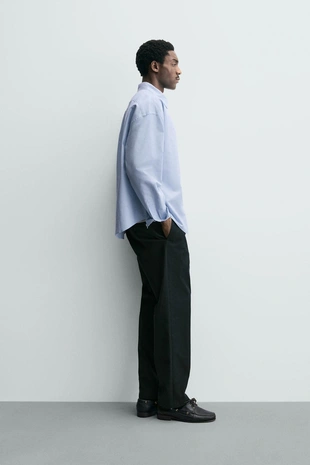 Брюки со складками из рельефной ткани- Заказать в России