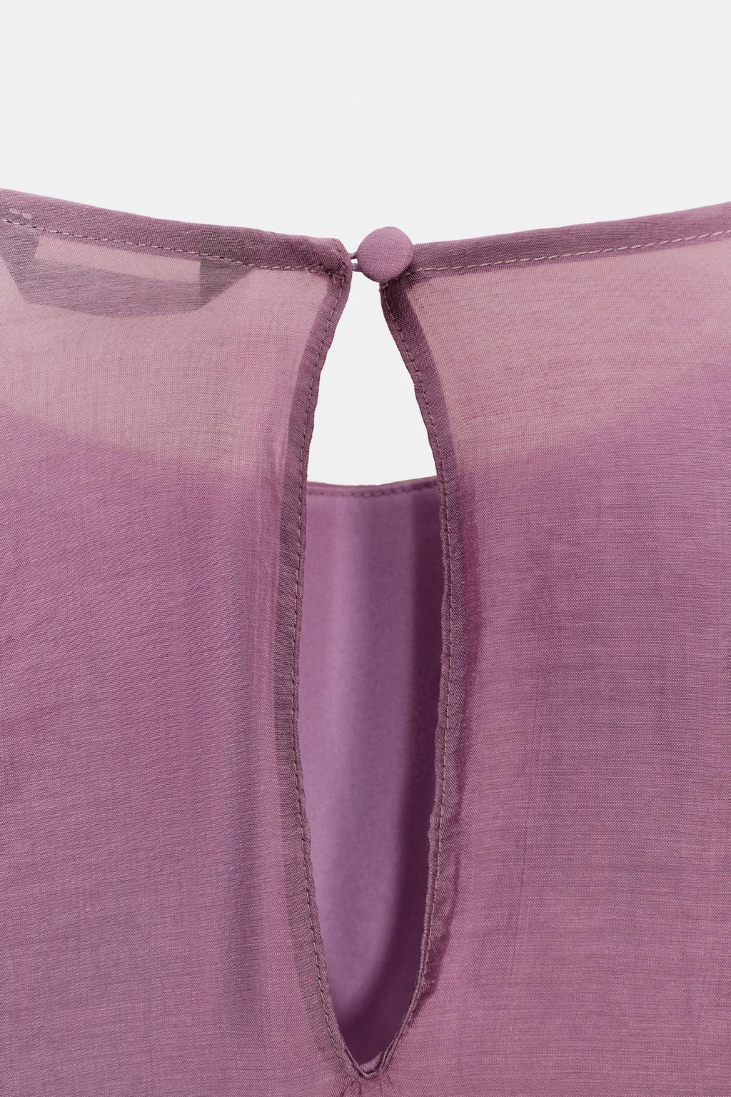 ТОП С АСИММЕТРИЧНЫМИ ВОЛАНАМИ