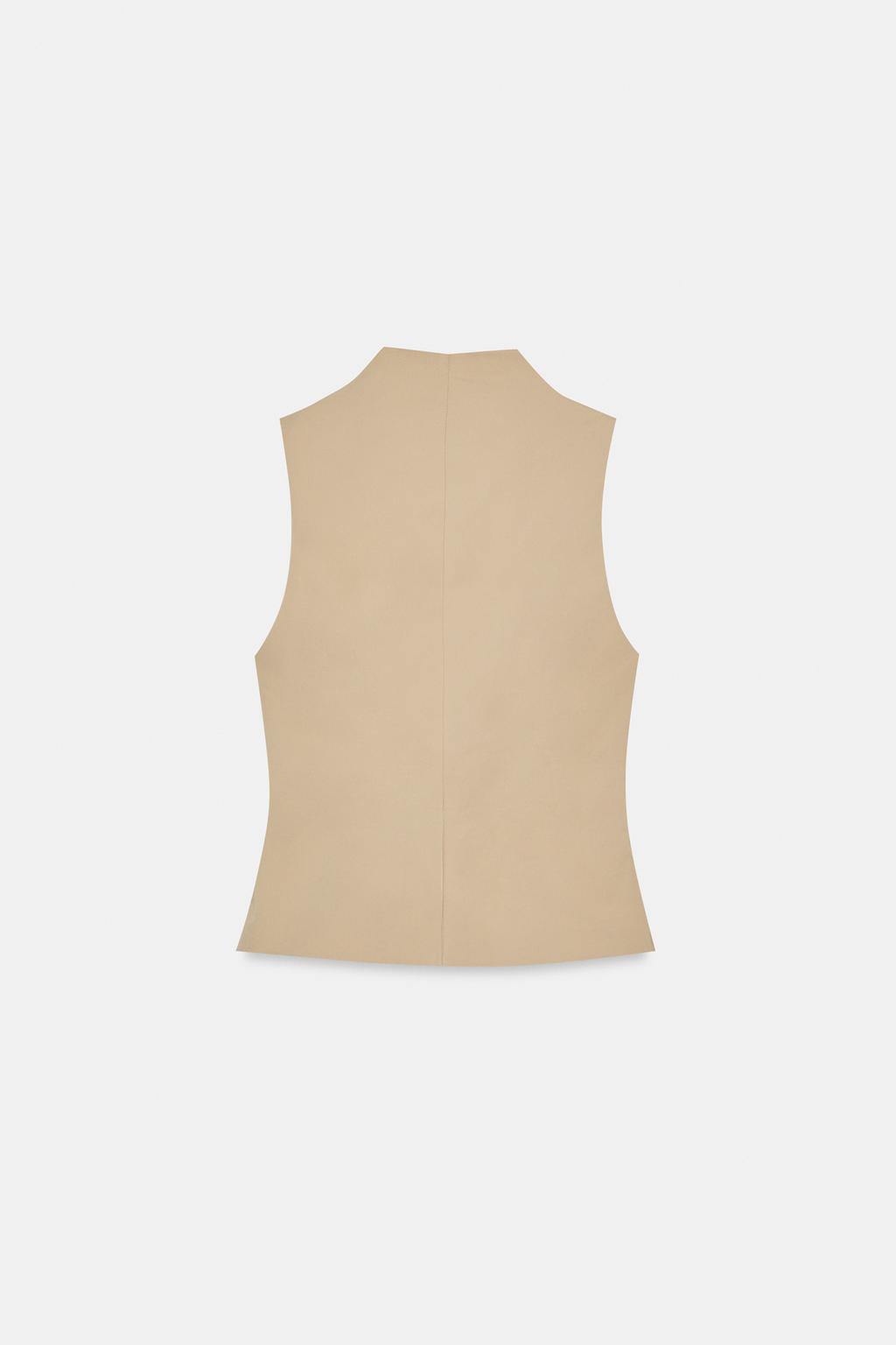 ЭЛАСТИЧНЫЙ ТОП С ПУГОВИЦАМИ