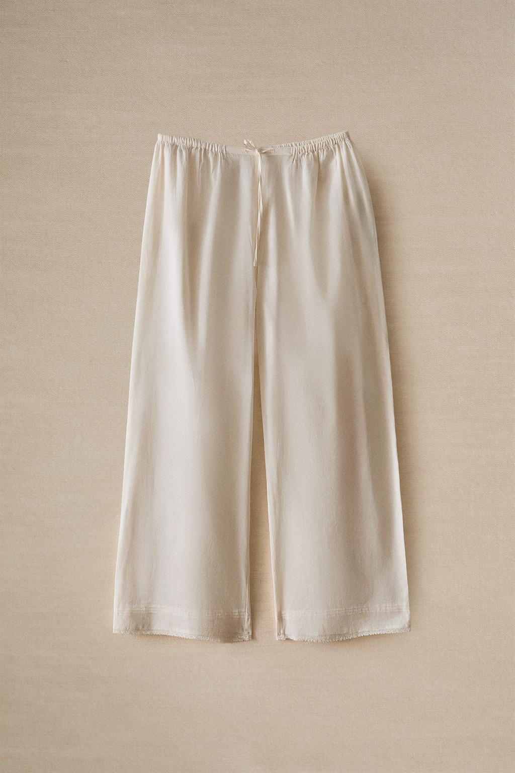 Брюки с кружевными вставками