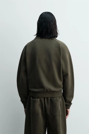 Свитшот свободного кроя с эффектом потертости