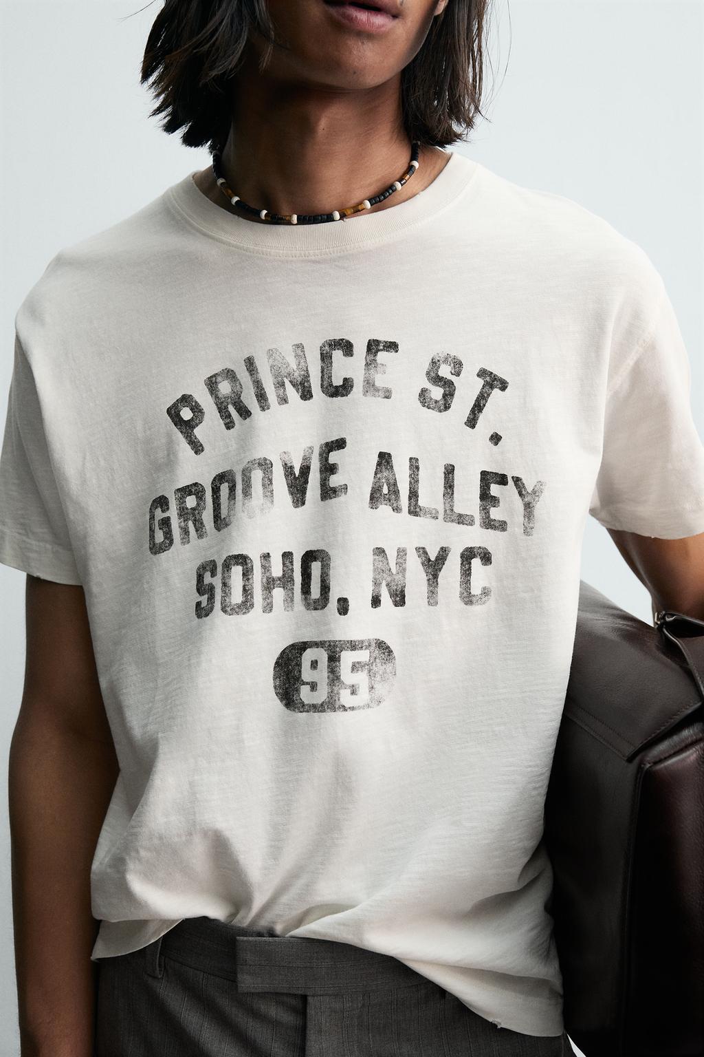 ФУТБОЛКА СВОБОДНОГО КРОЯ С ЭФФЕКТОМ ПОТЕРТОСТИ